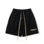 Fog Essentials Black Elastic Waist Long Beige Drawstring Gold Logo Print Street‑Wear Sweat Shorts