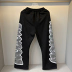 MIXED EMOTION Side Panel Graphic Wide-Leg Pants