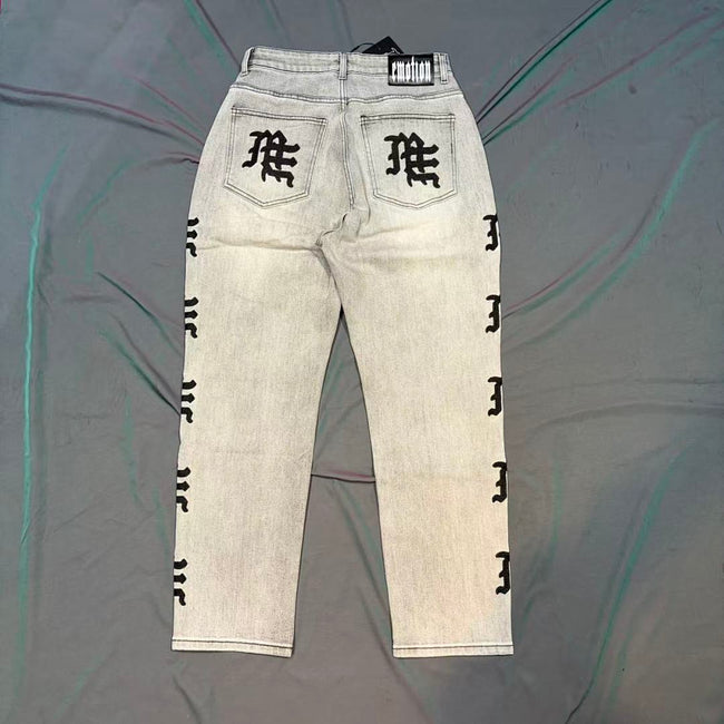 MIXED EMOTION Washed Side Graphic Denim Jeans Main Image