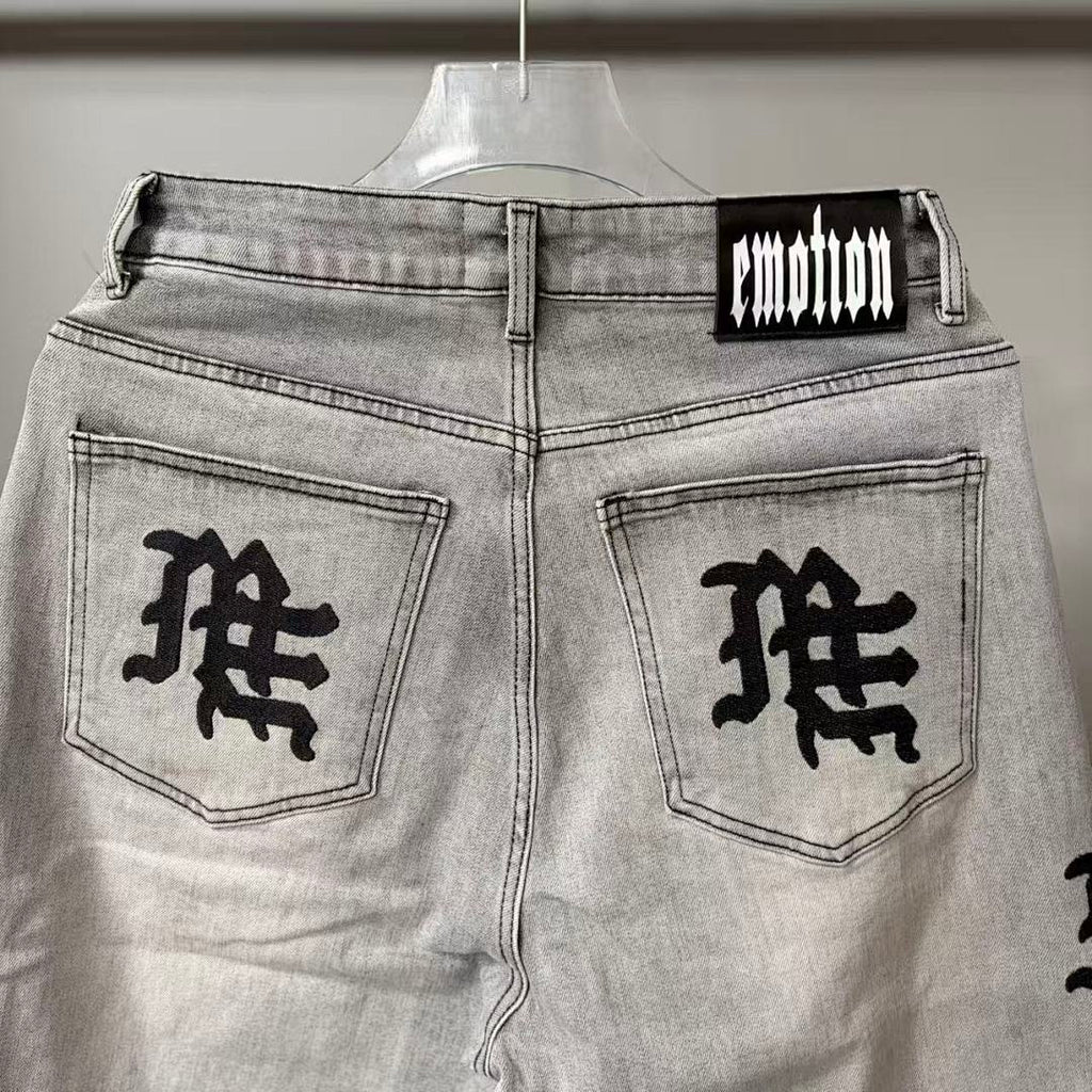 MIXED EMOTION Washed Side Graphic Denim Jeans