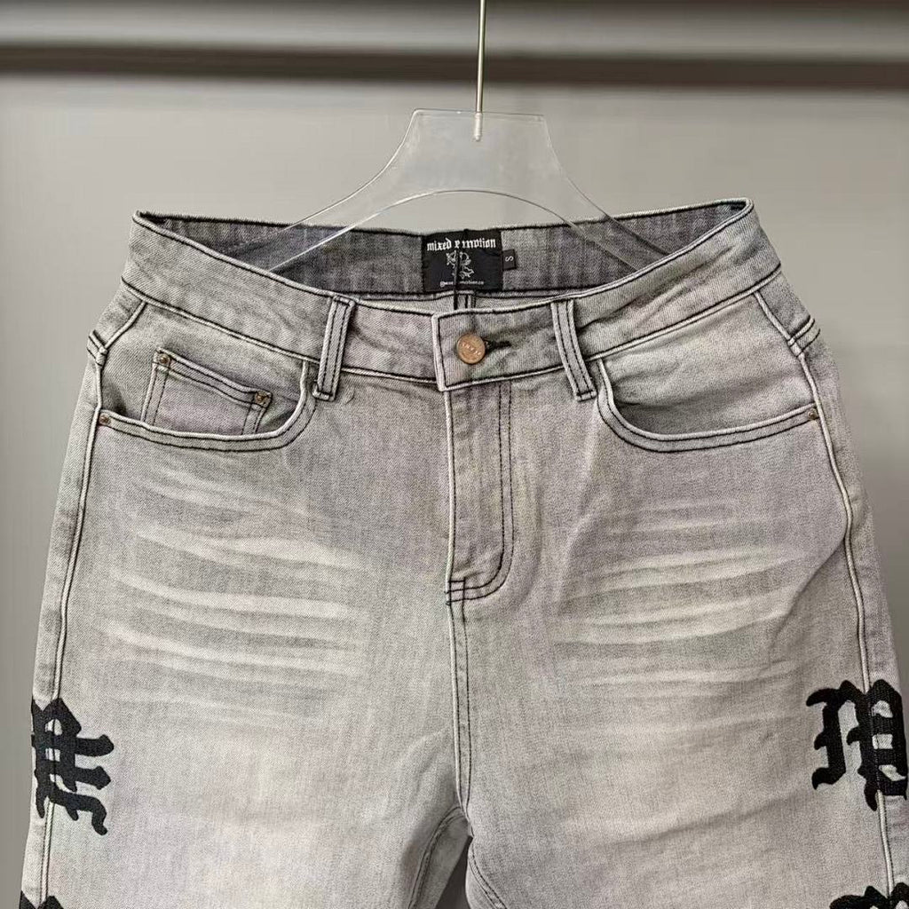MIXED EMOTION Washed Side Graphic Denim Jeans