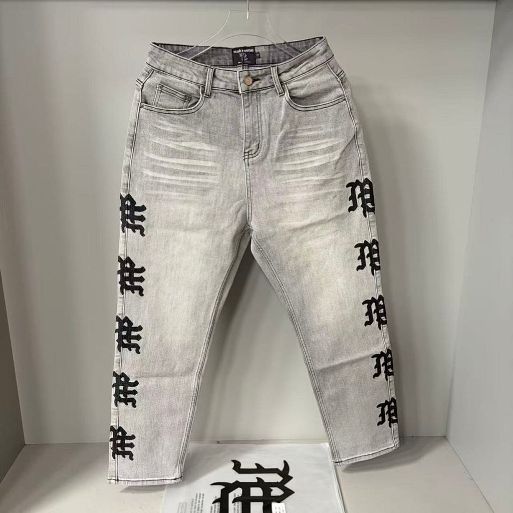 MIXED EMOTION Washed Side Graphic Denim Jeans