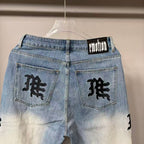 MIXED EMOTION Repeated Letter Side Graphic Jeans