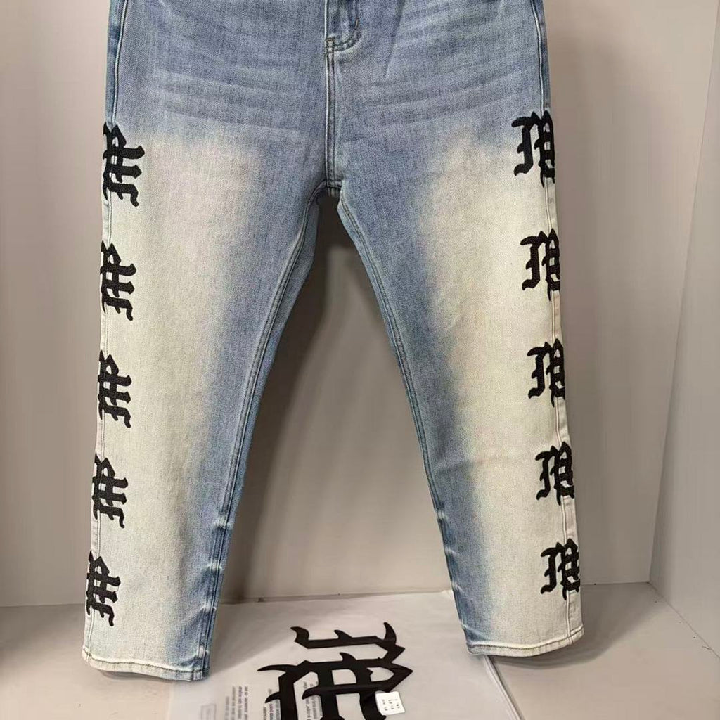 MIXED EMOTION Repeated Letter Side Graphic Jeans