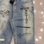 MIXED EMOTION Dual Graphic Distressed Denim Jeans