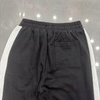 MIXED EMOTION Cross Logo Side Stripe Track Pants