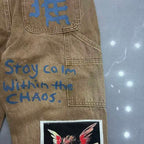MIXED EMOTION Patchwork Graphic Carpenter Jeans