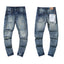 Multi‑Ripped Stitched Distressed Dark‑Wash Slim Denim Jeans