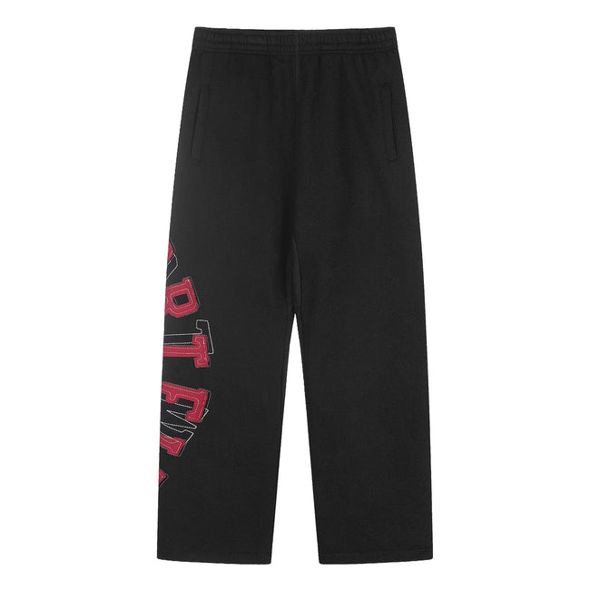 Black Graphic Straight-Leg Sweatpants | Minimalist Streetwear Pants with Red Side Print Detail Hover Image