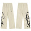 Cream Graphic Straight-Leg Sweatpants | Minimalist Streetwear Pants with Bold Side Print Detail